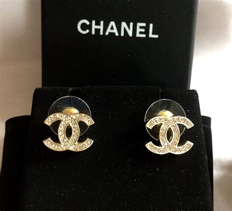 gold chanel studs|Chanel gold stud earrings.